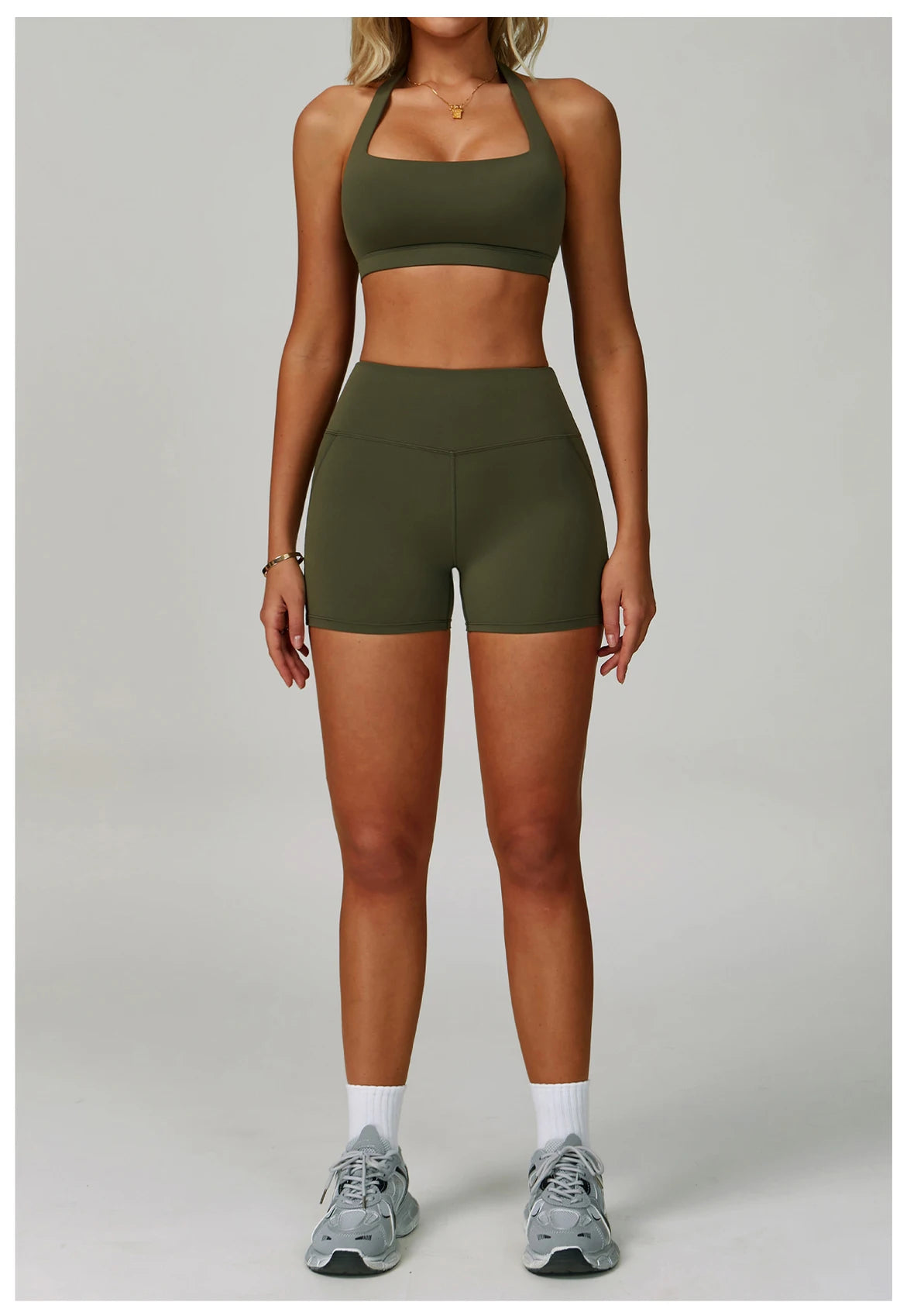 Women's fitness tracksuit set by The Clothing Company Sydney with high waist leggings and sports bra for yoga and workout sessions.