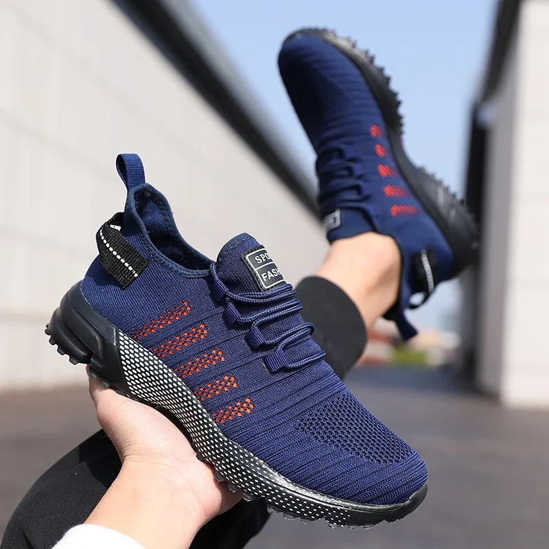 Men's casual sneakers by The Clothing Company Sydney featuring breathable mesh, lightweight design, soft sole, slip-on style, and trainer look.