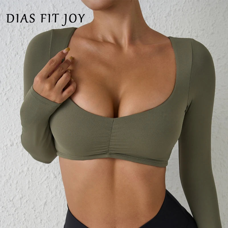 Nylon women's long-sleeve yoga top with pleated design, fitted waist, ideal for gym and fitness activities, by The Clothing Company Sydney
