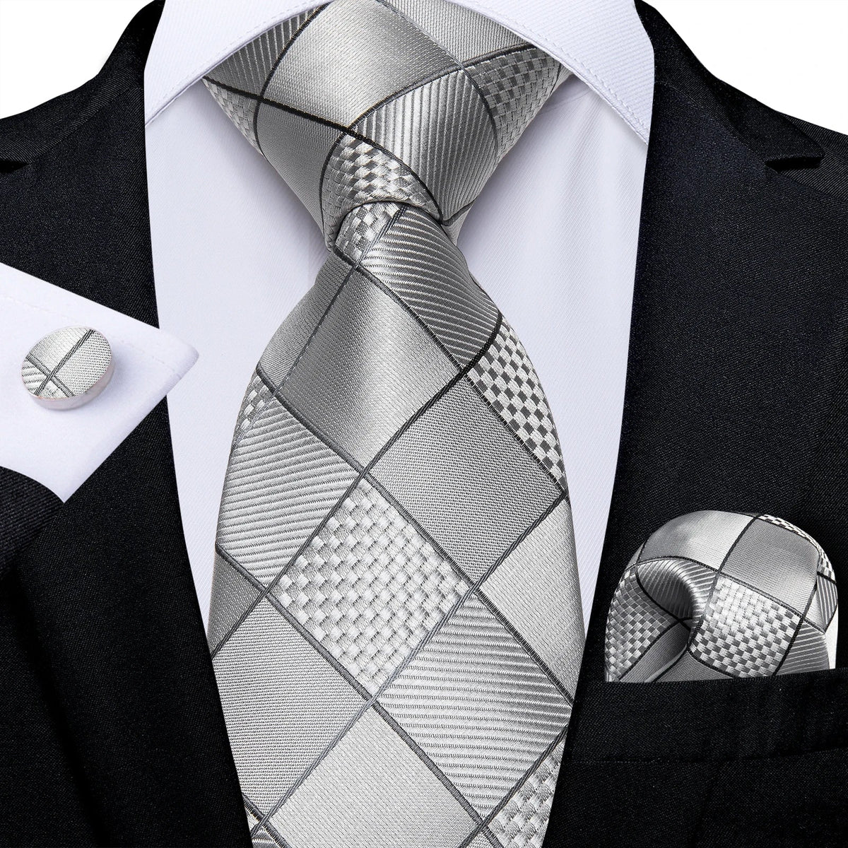 Men's gray paisley silk tie set with matching pocket square and cufflinks, ideal for weddings and formal occasions.