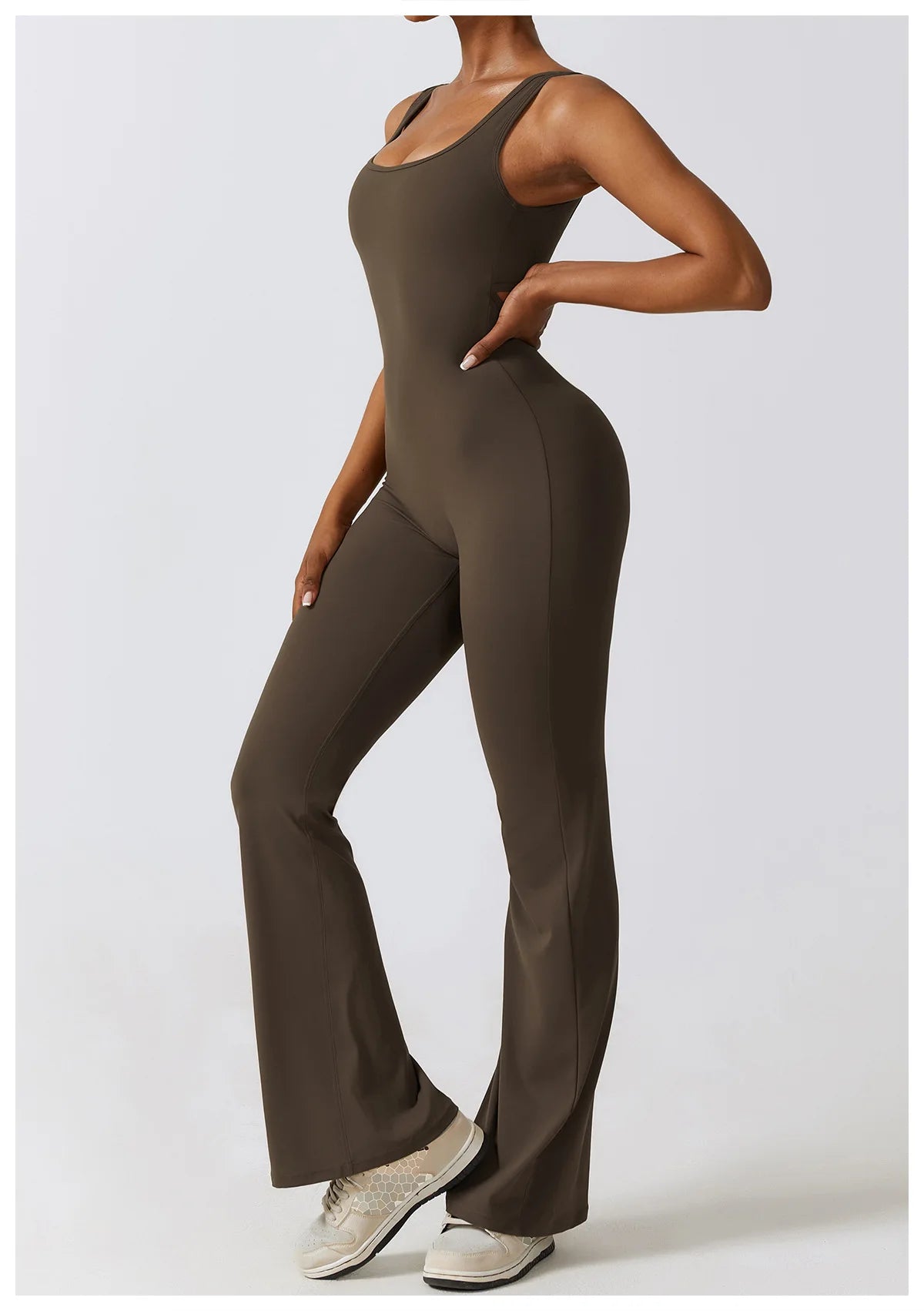 Open back V jumpsuit gym set for women, stylish fitness bodysuit from The Clothing Company Sydney, ideal for yoga, training, and workouts.