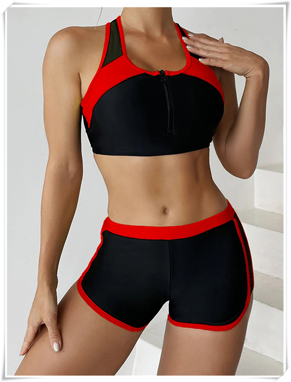 Two-piece swimsuit by The Clothing Company Sydney featuring a zipper tankini top and high-waist shorts for summer beachwear.