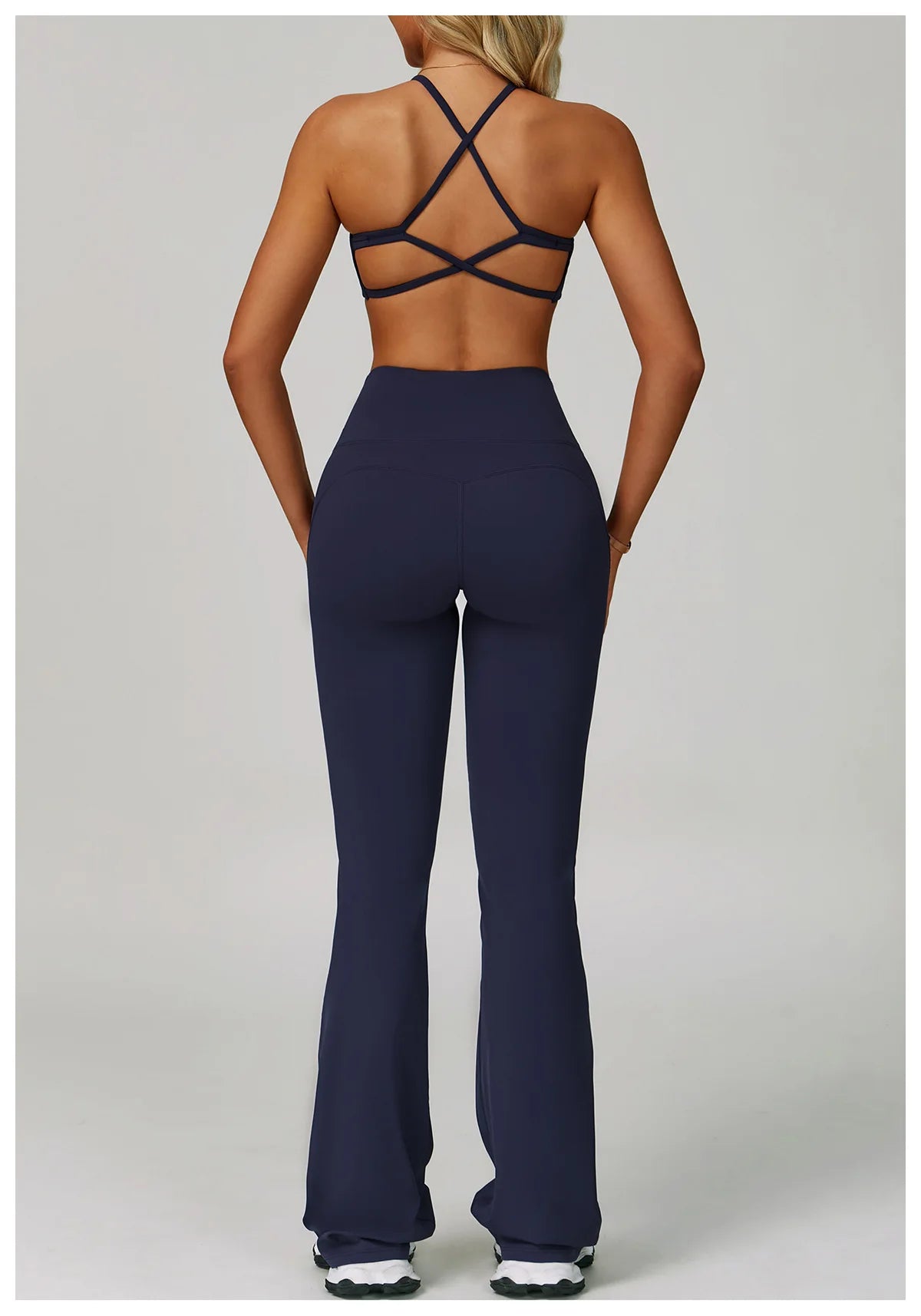 The Clothing Company Sydney women's 2-piece fitness tracksuit set with high waist leggings and sports bra for yoga and workout.