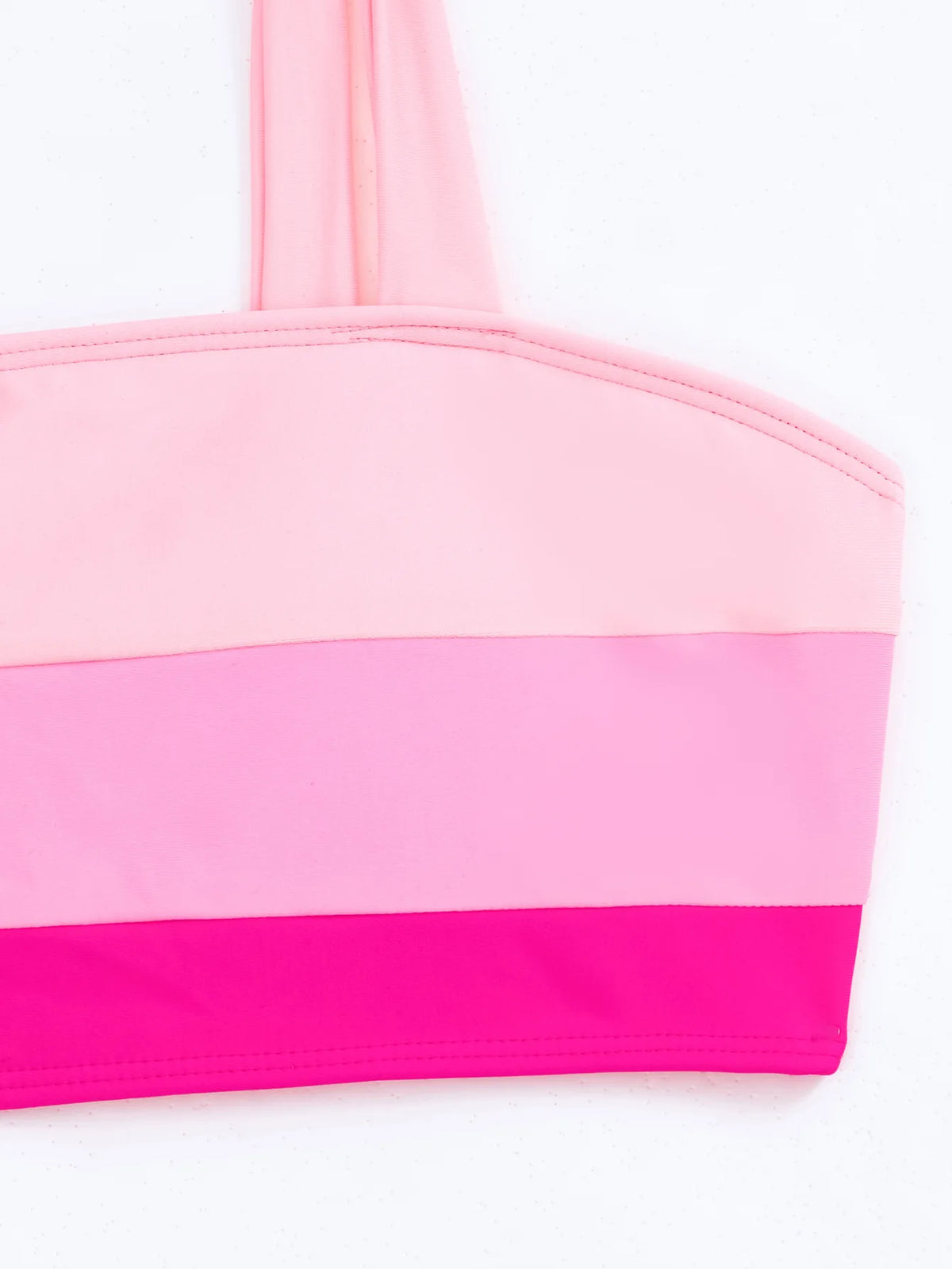 Pink sexy bikini set with push-up design, featuring Brazilian-style swimwear for women, perfect for beach or poolside lounging.
