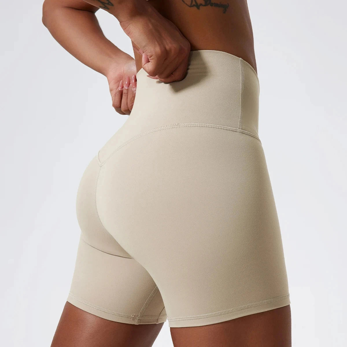 High-waist yoga shorts by The Clothing Company Sydney, featuring supportive fit for women’s workout, running, and gym activities.