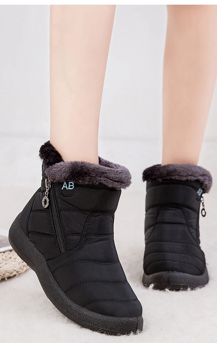 Women’s winter snow boots with warm fur lining, ankle-high footwear by The Clothing Company Sydney, ideal for cold weather.