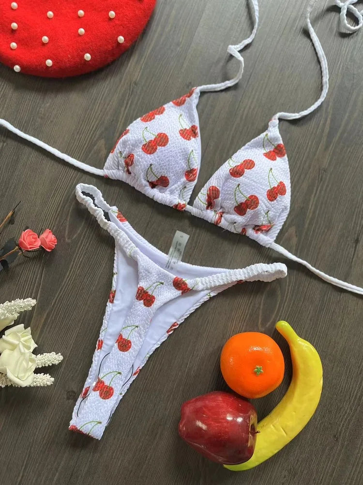 Cherry print thong bikini set by The Clothing Company Sydney, featuring a two-piece swimwear design for beach and pool wear.