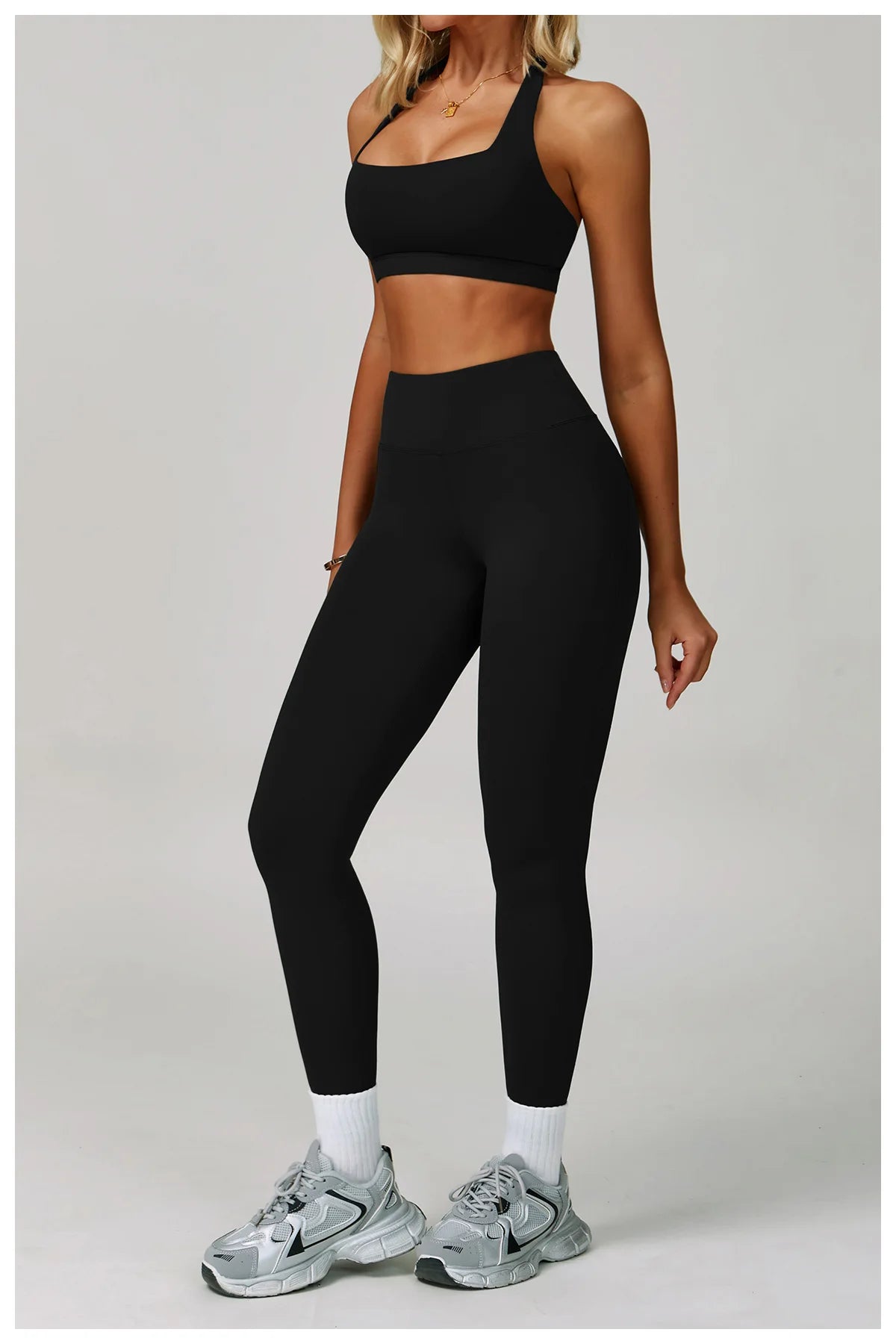 Women’s fitness tracksuit set by The Clothing Company Sydney, includes sports bra and high waist leggings for yoga and workout sessions.