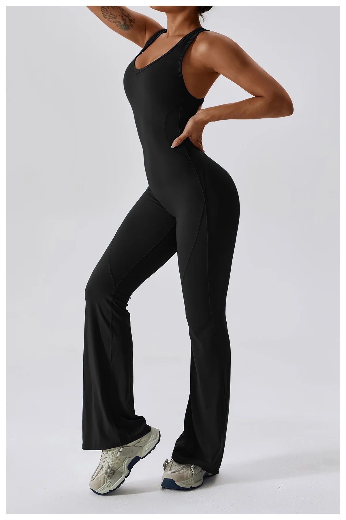Open back V jumpsuit gym set for women, featuring stretch fabric, suitable for yoga, training, and fitness activities by The Clothing Company Sydney.