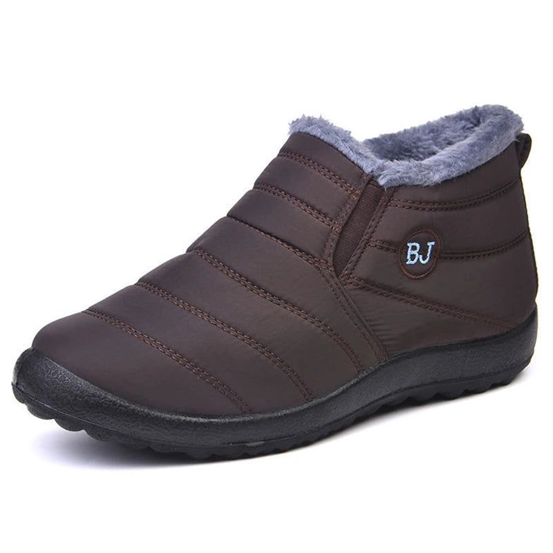 Women's waterproof fur snow boots by The Clothing Company Sydney, slip-on ankle footwear with warm fur lining and rugged sole for winter.