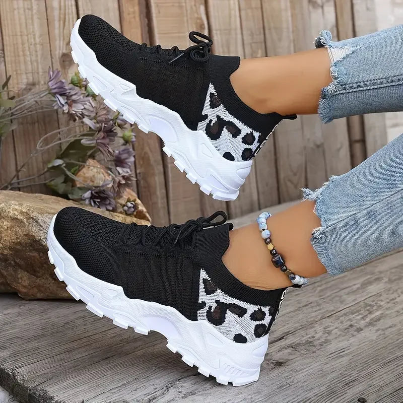 Leopard print women's waterproof sneakers from The Clothing Company Sydney, showcasing stylish footwear with bold pattern.