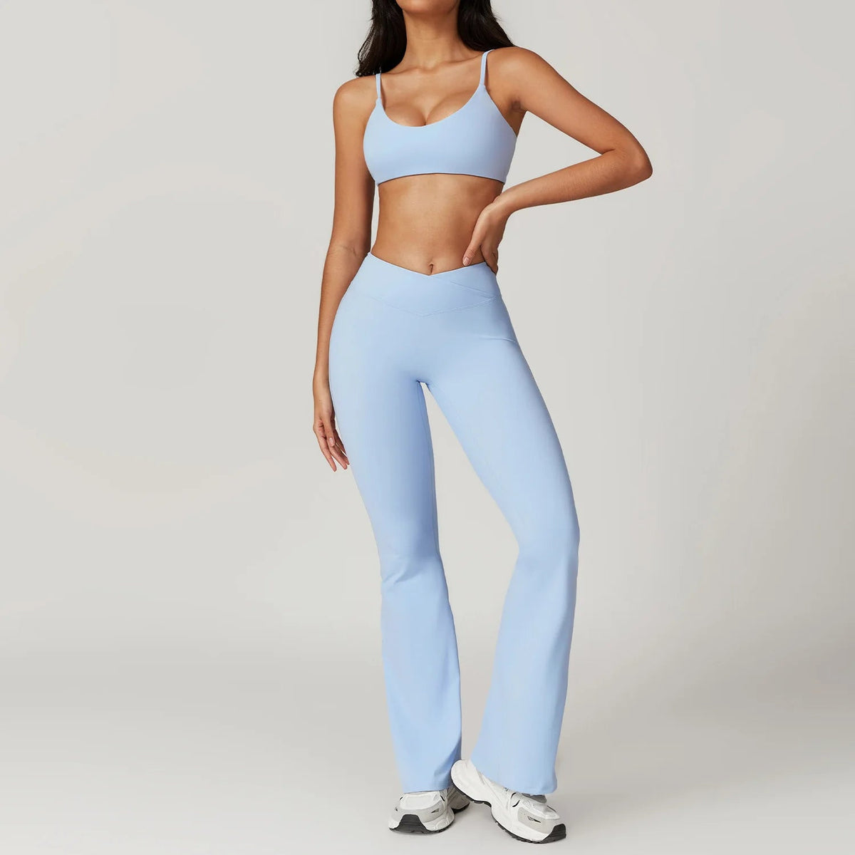 Two-piece women's fitness set including crop top, sports bra, leggings, and bike shorts from The Clothing Company Sydney.