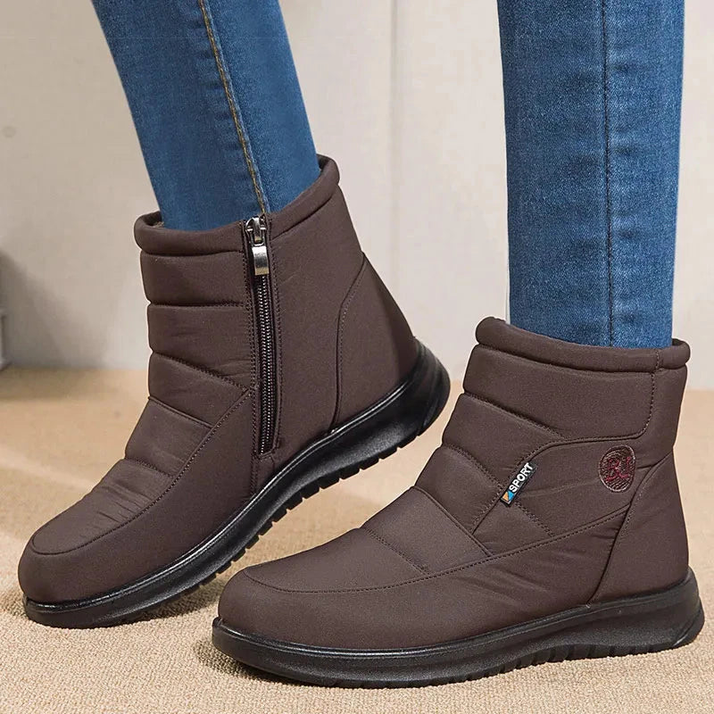 Women’s ankle low heel snow boots by The Clothing Company Sydney, winter flat shoes with durable soles and cozy lining.