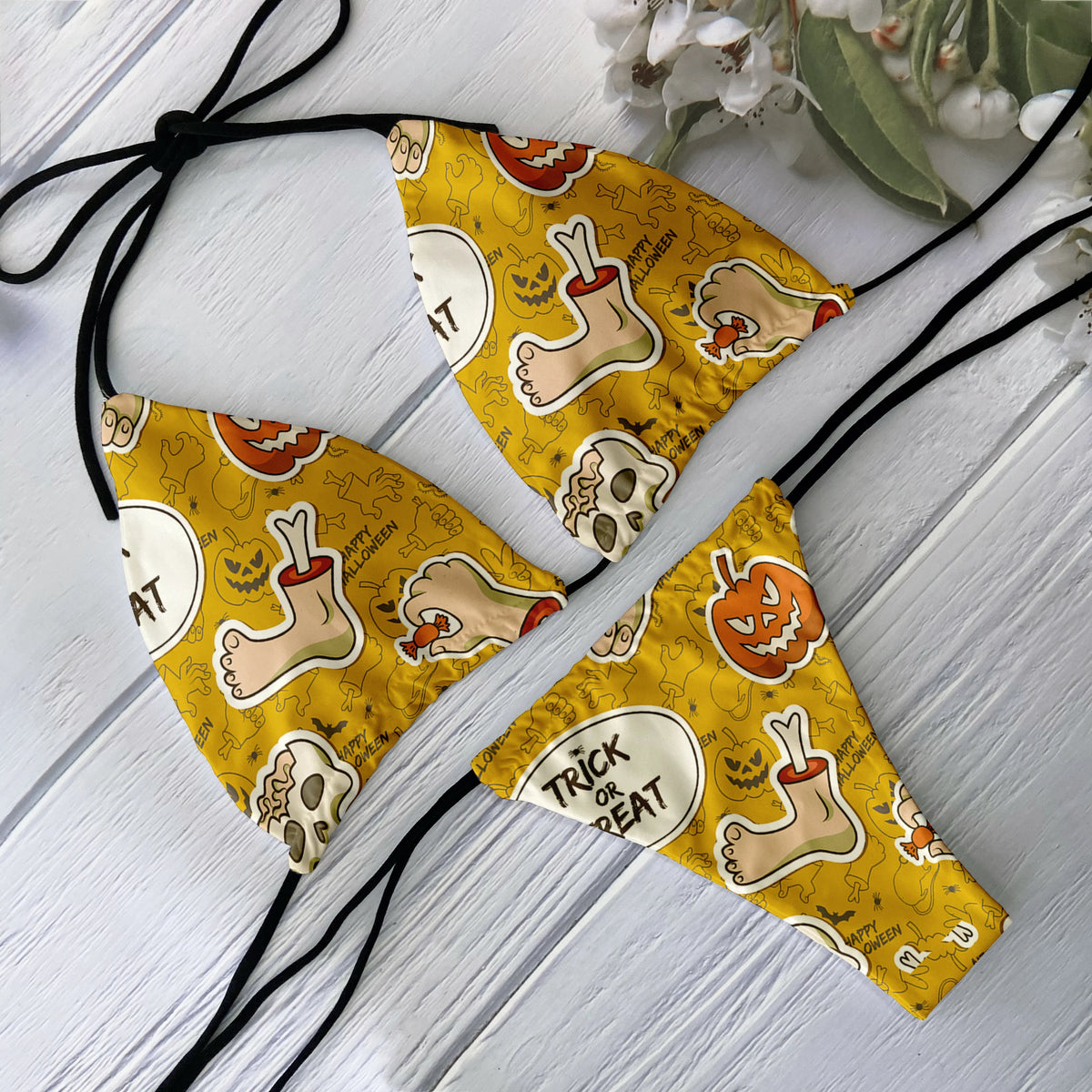 Backless skull pattern bikini set for women, low waist swimsuit from The Clothing Company Sydney, perfect for beach and surfing.