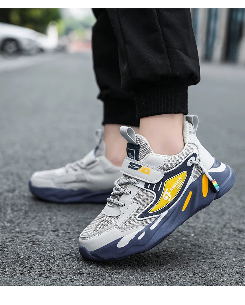 Kids' breathable mesh sneakers by The Clothing Company Sydney with non-slip soles and hook & loop closure for ages 7-13.