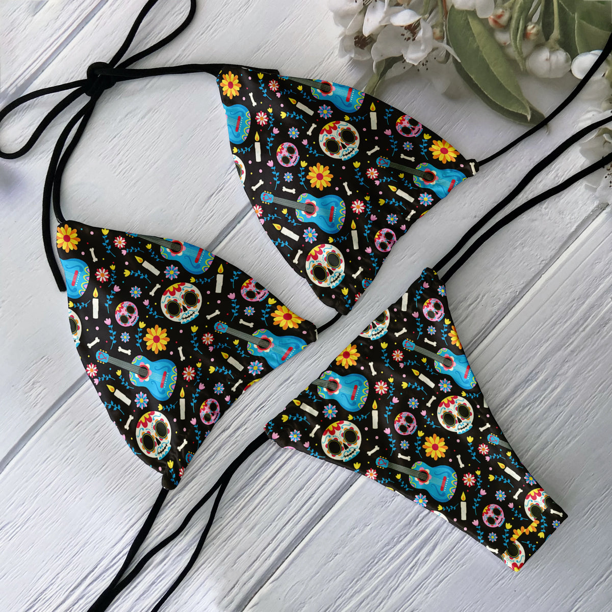 Backless 2-piece bikini set for women with skull print, low waist design, ideal for beach surfing and vacation by The Clothing Company Sydney
