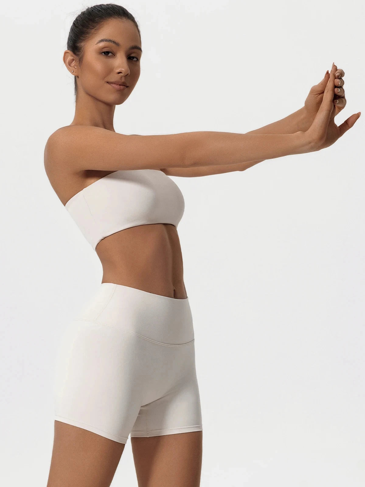 Two-piece women's fitness sports set featuring a strapless sports bra and matching gym crop top by The Clothing Company Sydney.