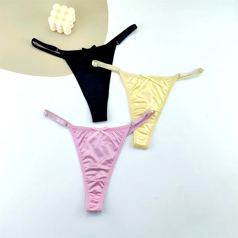 Three pack of adjustable satin thong G-string lingerie with low waist T-back design and bows by The Clothing Company Sydney.