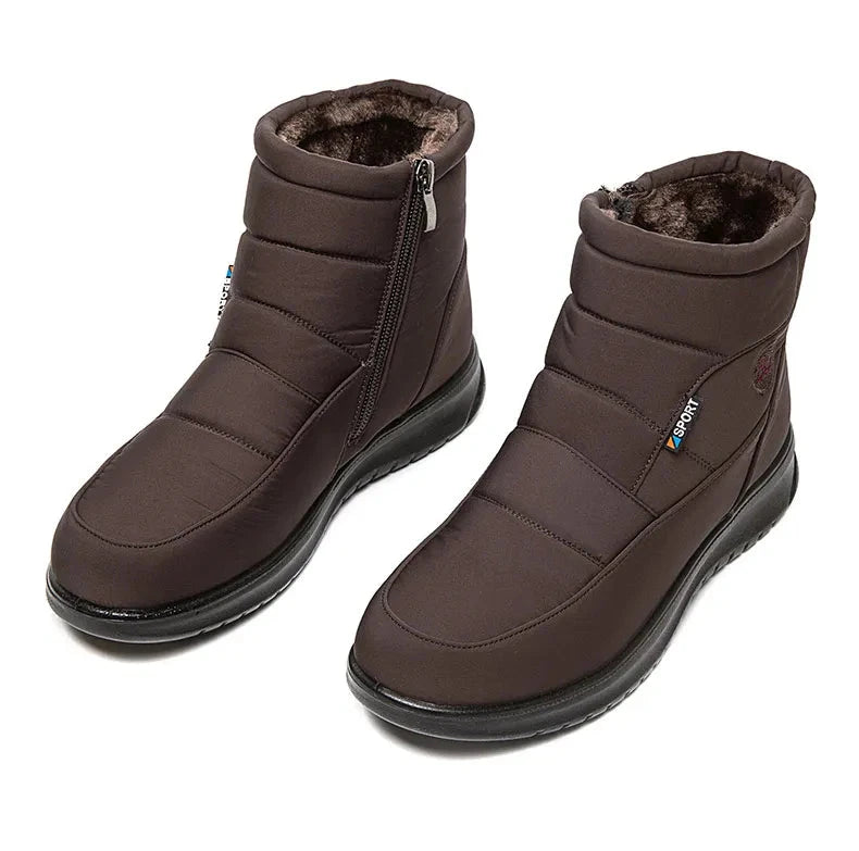 Women’s ankle low heel snow boots in winter flat shoes, featuring warm insulation and durable winter footwear design.