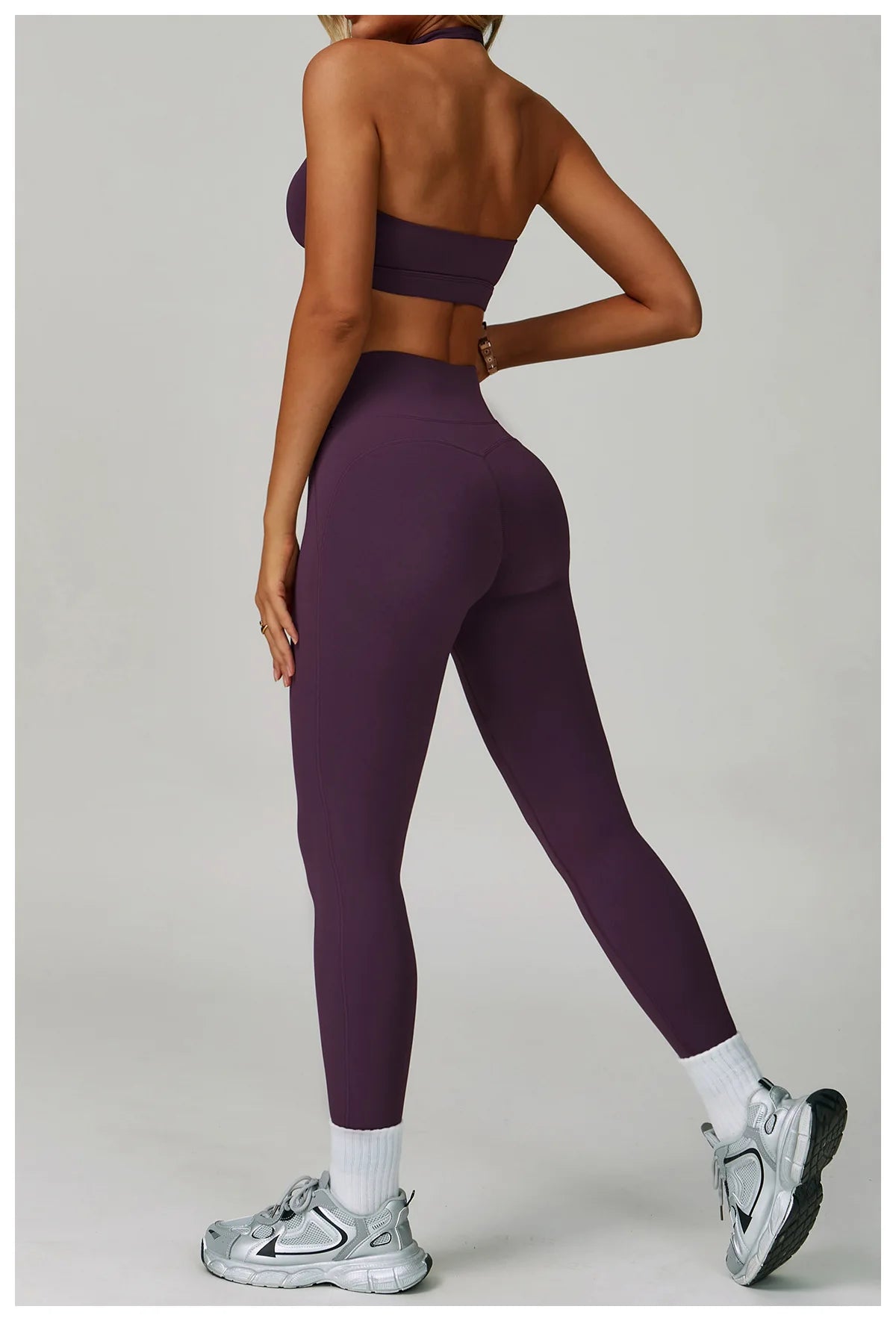 Women's fitness tracksuit set by The Clothing Company Sydney featuring high-waist leggings and a sports bra for workout and yoga.