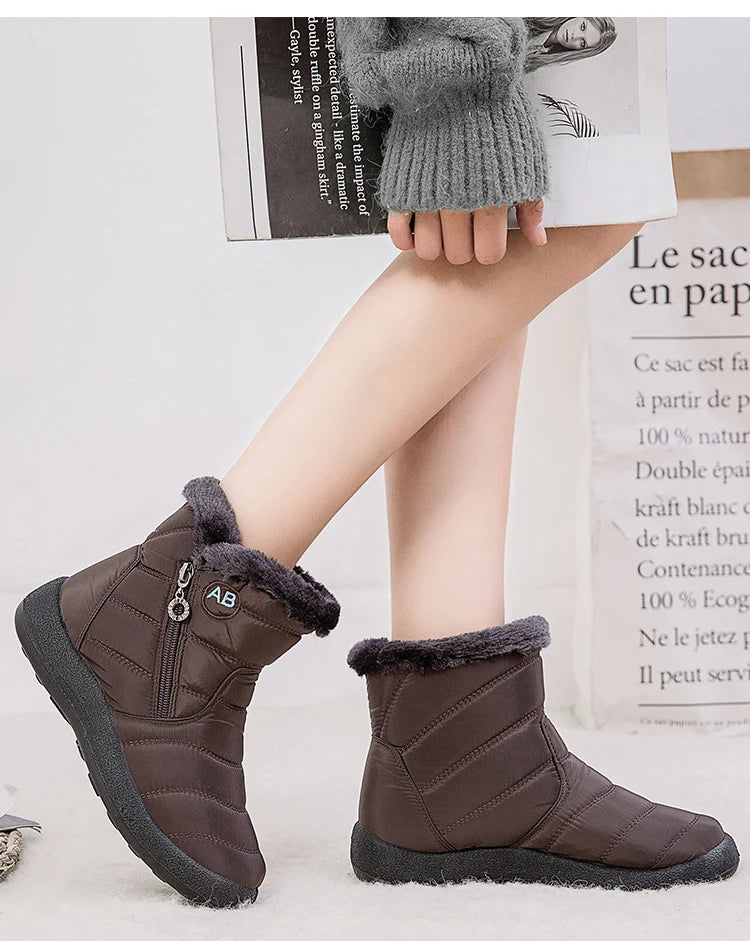 Women’s winter snow boots by The Clothing Company Sydney with warm fur lining and ankle height, ideal for cold weather.