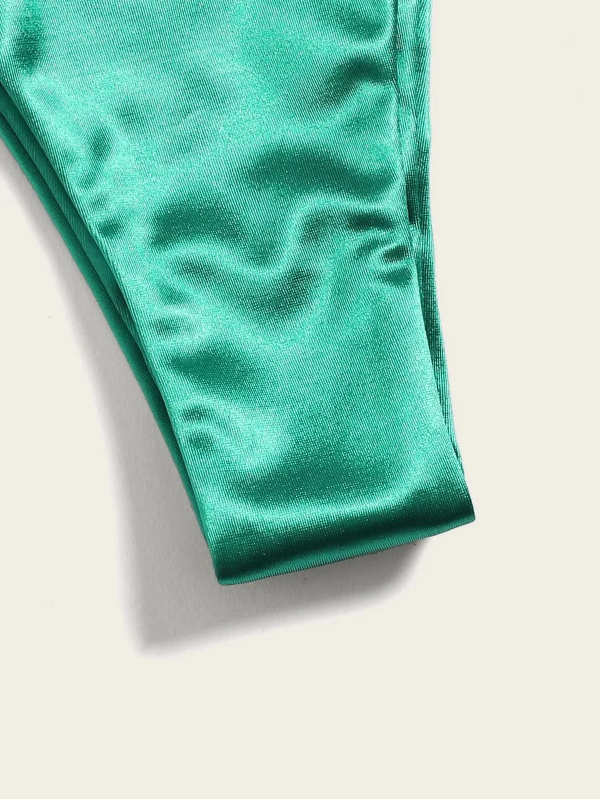 Two-piece Brazilian metallic satin bikini set by The Clothing Company Sydney featuring a halter top and high-cut bottoms, perfect for beachwear.