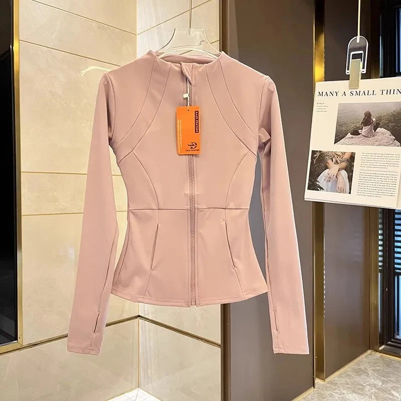 Women’s fitness zip sports jacket by The Clothing Company Sydney, long sleeve workout top with a slim fit and warm activewear design.