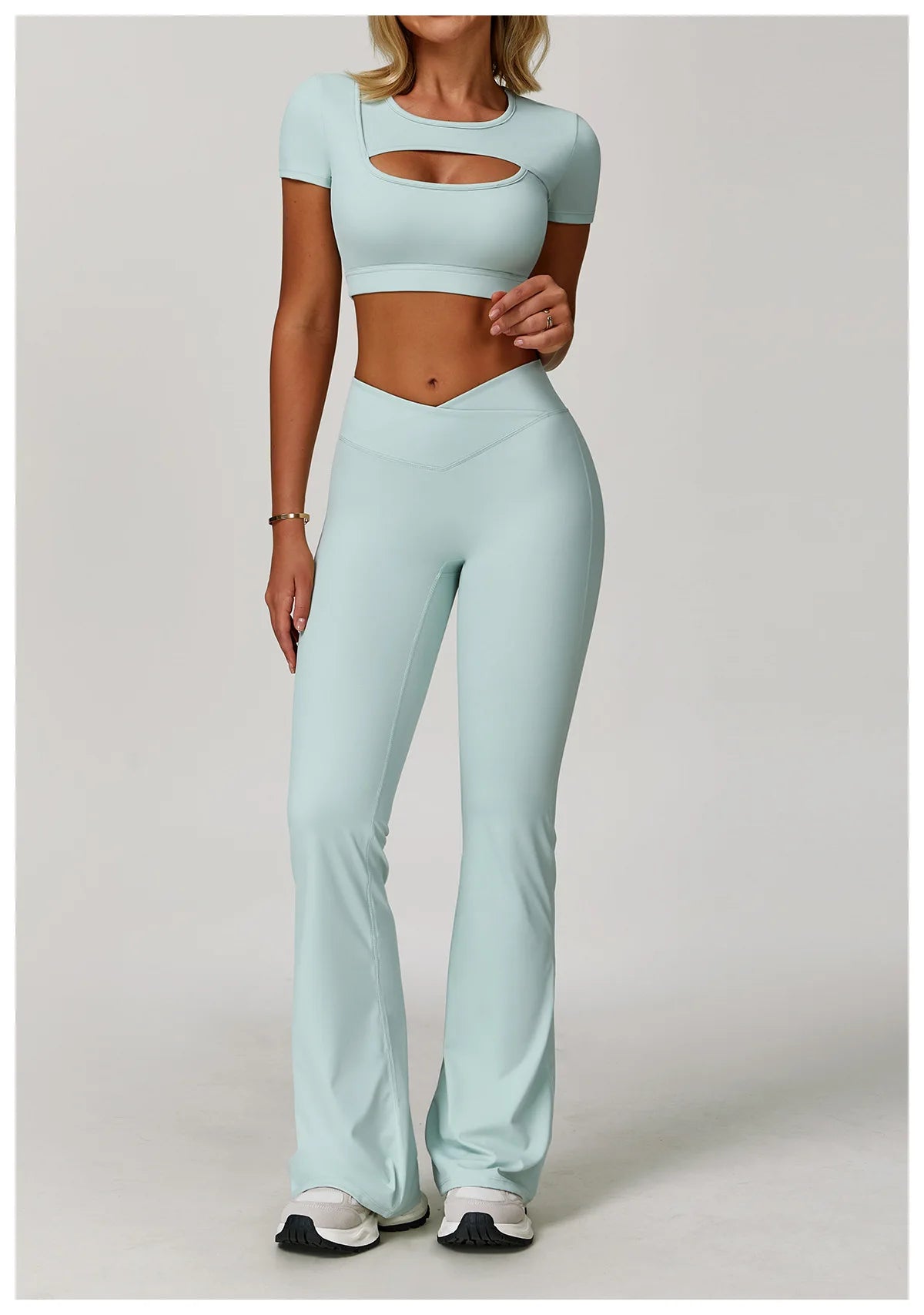 Two-piece women's fitness yoga and gym outfit from The Clothing Company Sydney, includes sports bra and matching leggings for workout.
