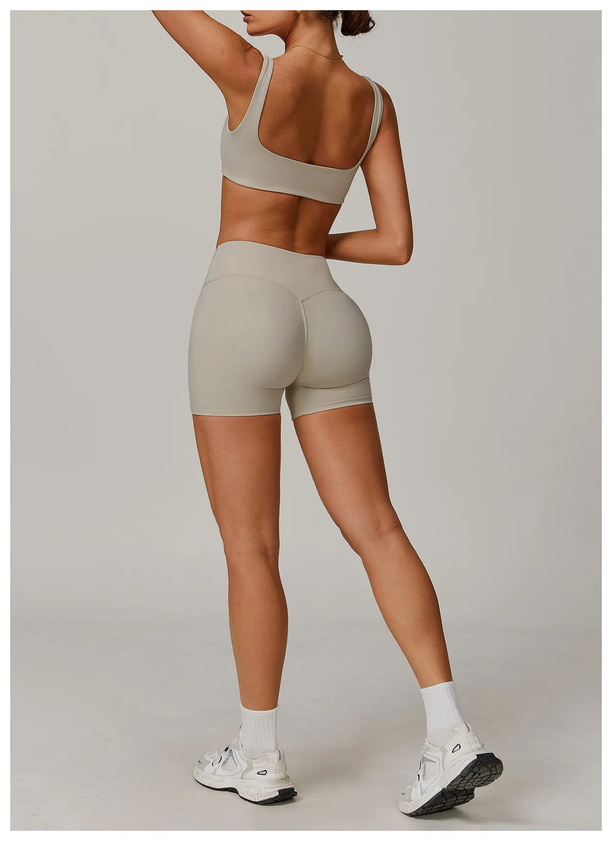 Two-piece women's yoga and workout set from The Clothing Company Sydney featuring sports bra and leggings for gym and running.