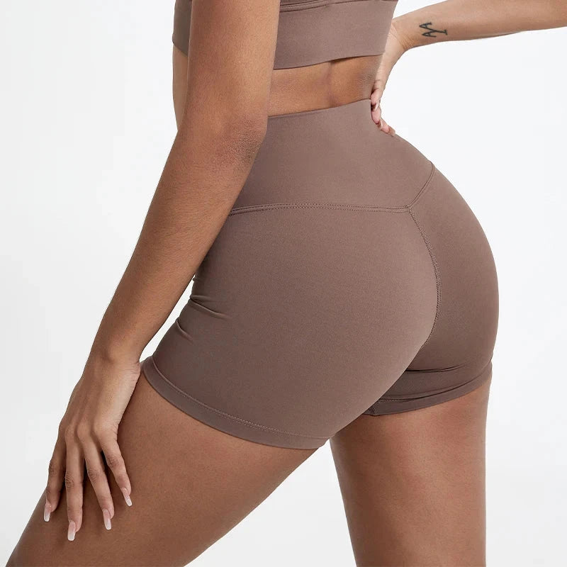 Women's high waist fitness gym leggings and yoga shorts by The Clothing Company Sydney, featuring a slim fit design for workout comfort.