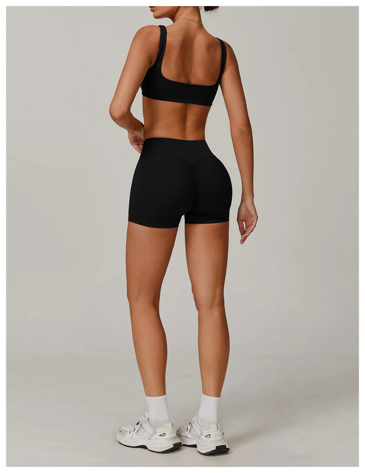 Two-piece women's yoga and workout set with sports bra and leggings from The Clothing Company Sydney, ideal for gym and running.