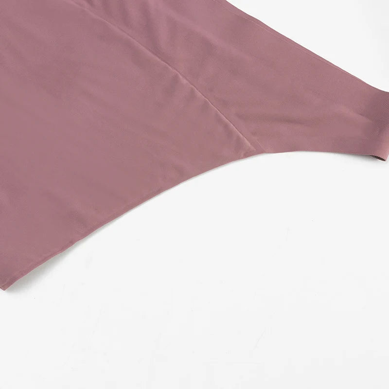 Five-pack plus size seamless thong menstrual panties by The Clothing Company Sydney, leak-proof period underwear with absorbency.
