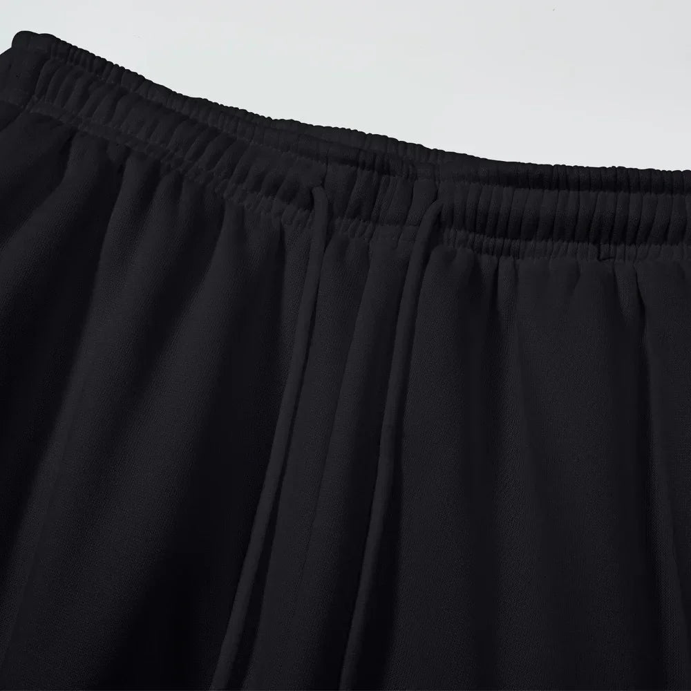 Men's cargo jogger pants by The Clothing Company Sydney, loose fit fleece sweatpants with multiple pockets, streetwear style.