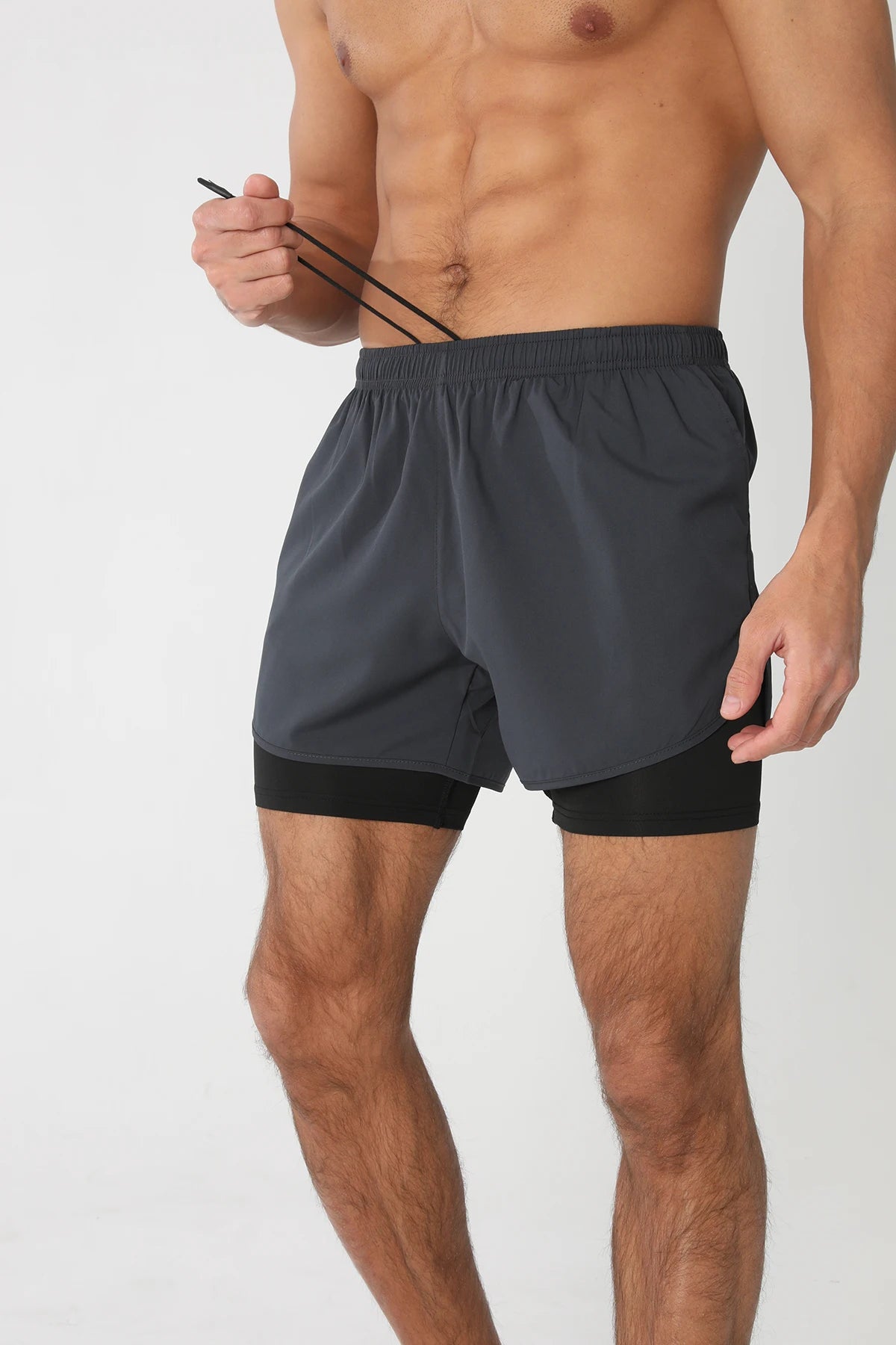 Men's lightweight gym running shorts by The Clothing Company Sydney with breathable fabric, liner, pockets, and towel loop for athletic workouts.
