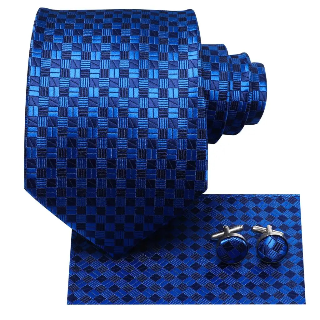 Blue paisley silk tie set including necktie, cufflinks, and hanky from The Clothing Company Sydney, accessories for men's formal wear.