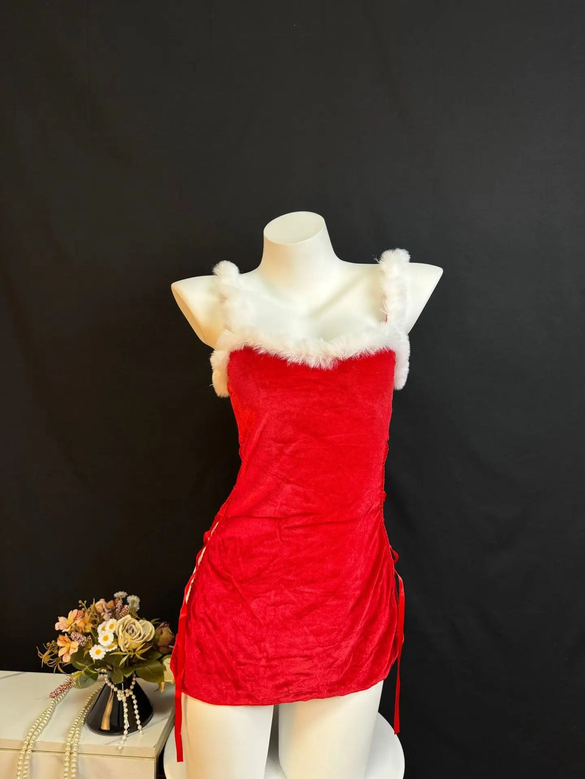 Red velvet women's Christmas dress and thong set with sparkling details, featuring split straps for elegant holiday party cosplay.