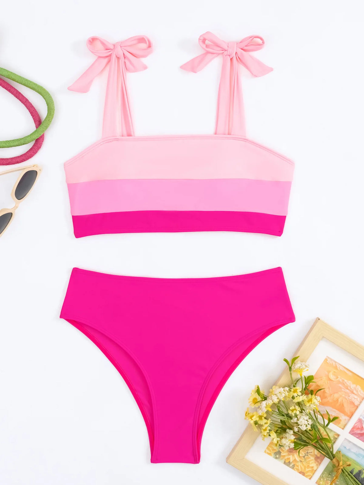 Pink sexy bikini set by The Clothing Company Sydney featuring a push-up style, women’s swimwear, Brazilian design for beach or pool.
