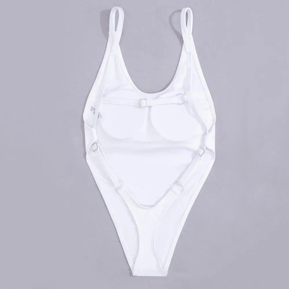 Backless micro thong one-piece swimsuit for women by The Clothing Company Sydney, featuring a sleek, minimal design and open back.