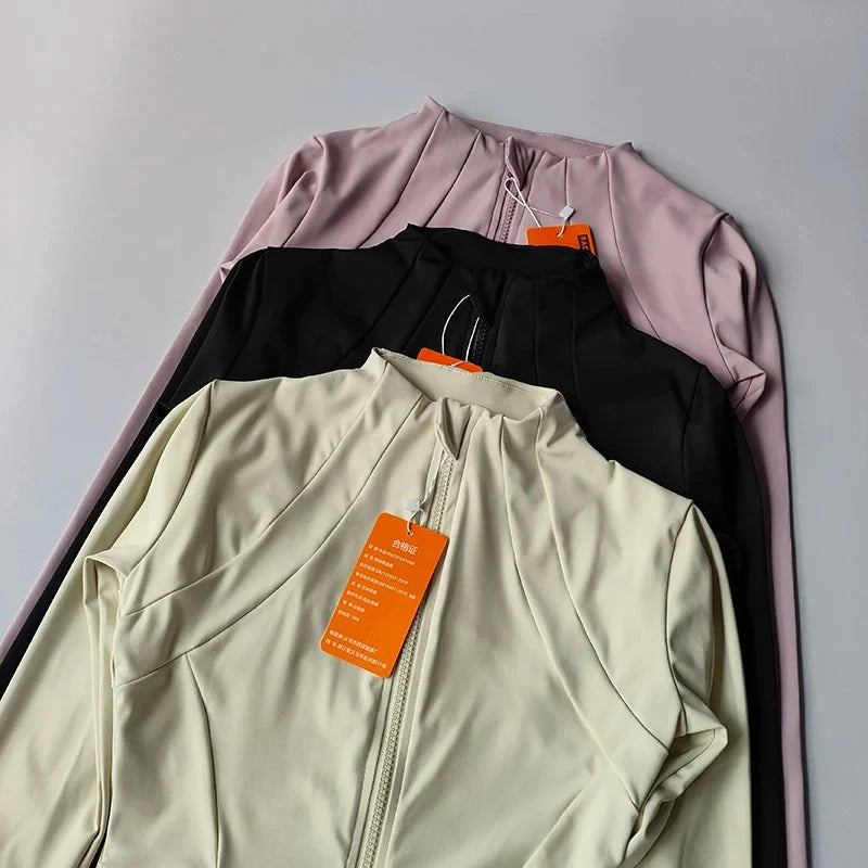 Women’s fitness sports jacket by The Clothing Company Sydney, long sleeve zip-up yoga and running top, slim fit activewear coat.