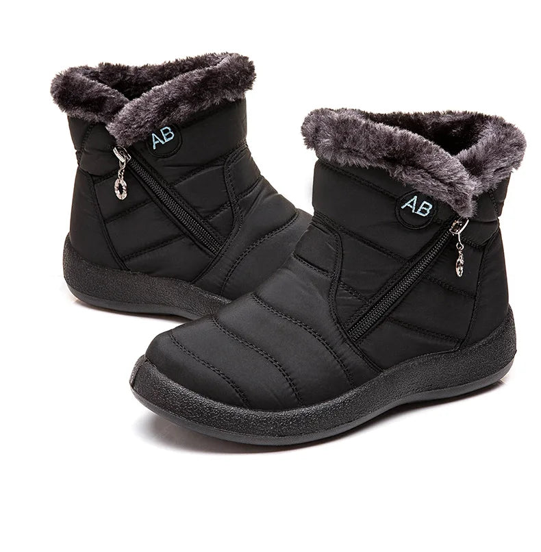 Women's winter ankle boots by The Clothing Company Sydney with low heels, snow-ready winter footwear in black leather.