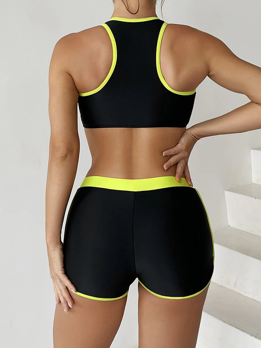 Two-piece swimsuit from The Clothing Company Sydney featuring a zipper tankini top and high-waist shorts for summer beachwear.