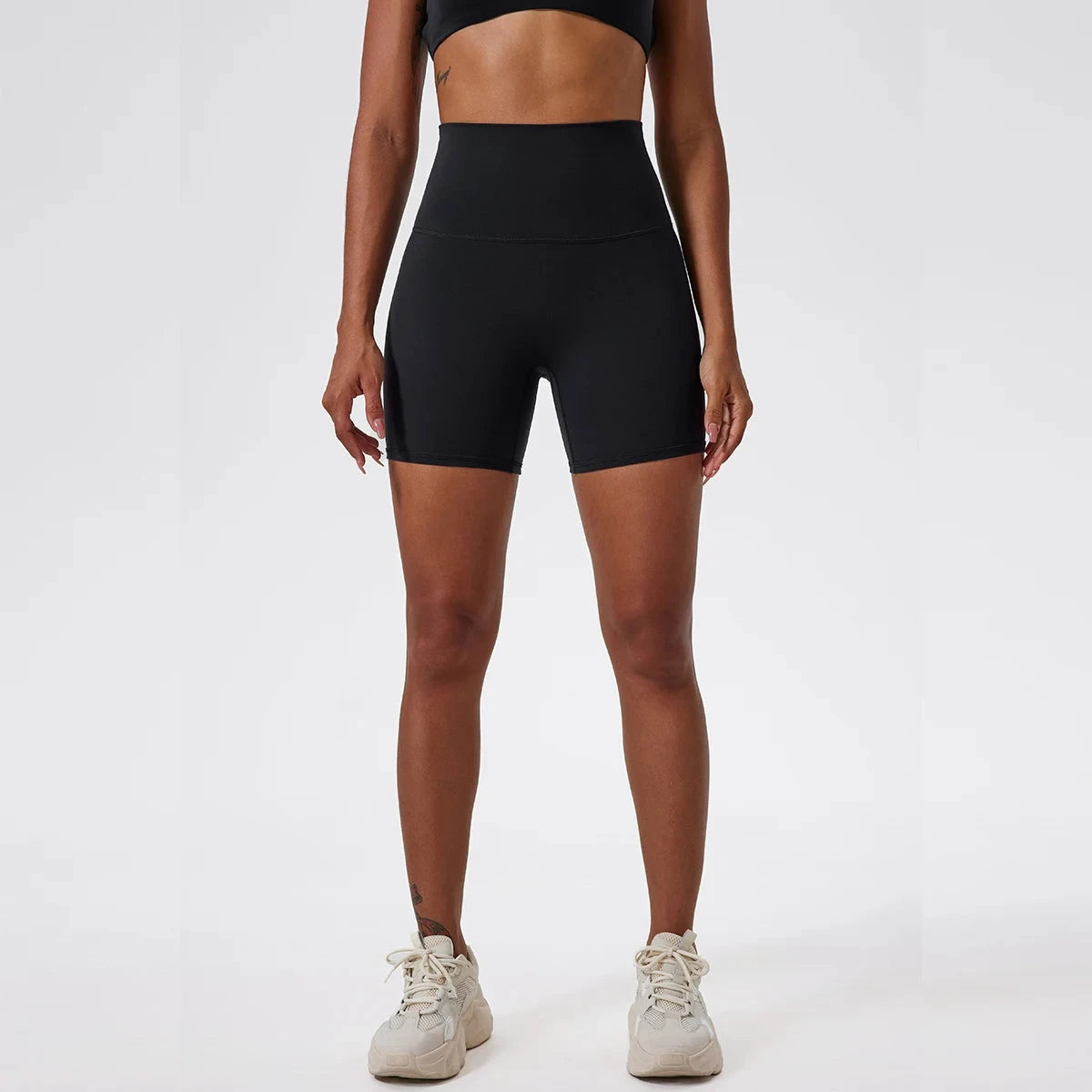 High-waist women's yoga shorts from The Clothing Company Sydney, featuring fitted gym leggings for running and workout activities.