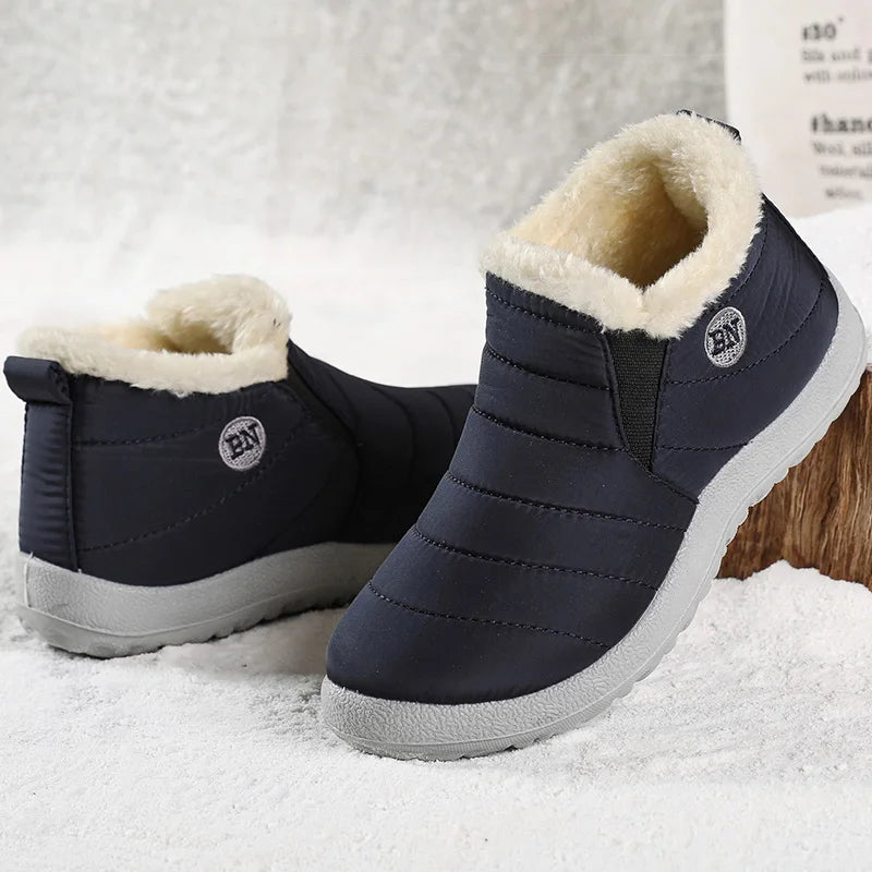 Men's winter ankle boots by The Clothing Company Sydney, slip-on waterproof snow shoes with fur lining and rugged sole.