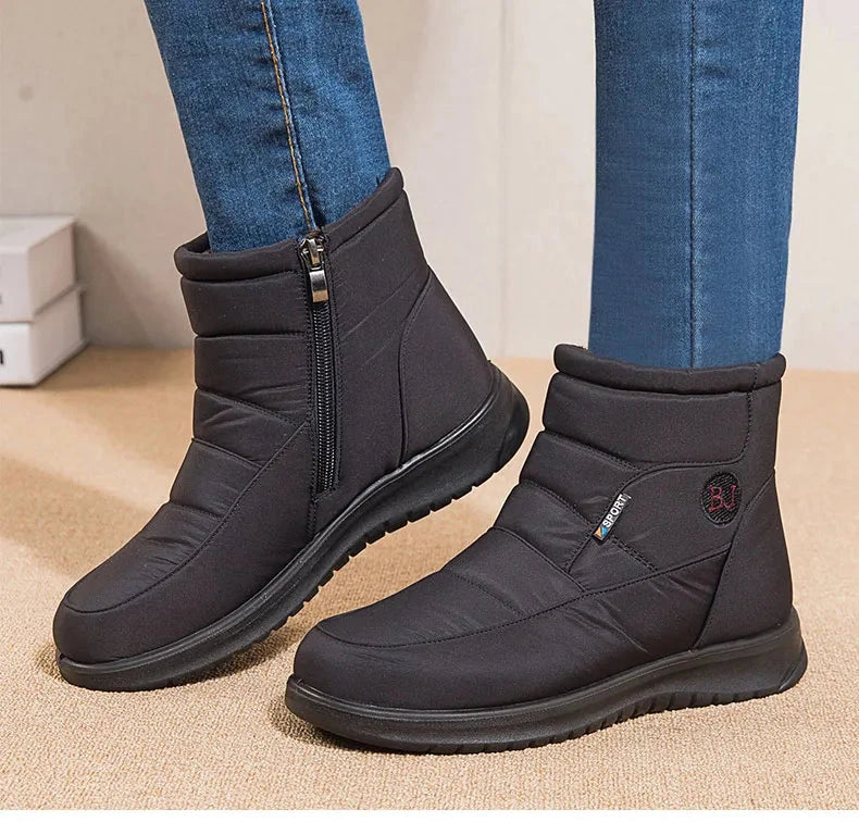 Women’s ankle low heel snow boots by The Clothing Company Sydney, winter flat shoes with a stylish, insulated design for cold weather.