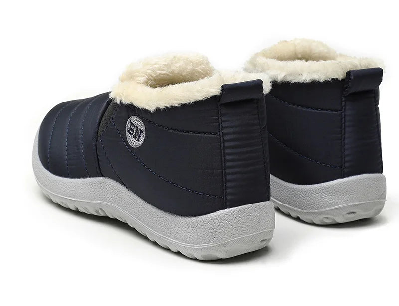 Men's winter ankle boots by The Clothing Company Sydney, slip-on waterproof snow shoes with fur lining and rugged sole.