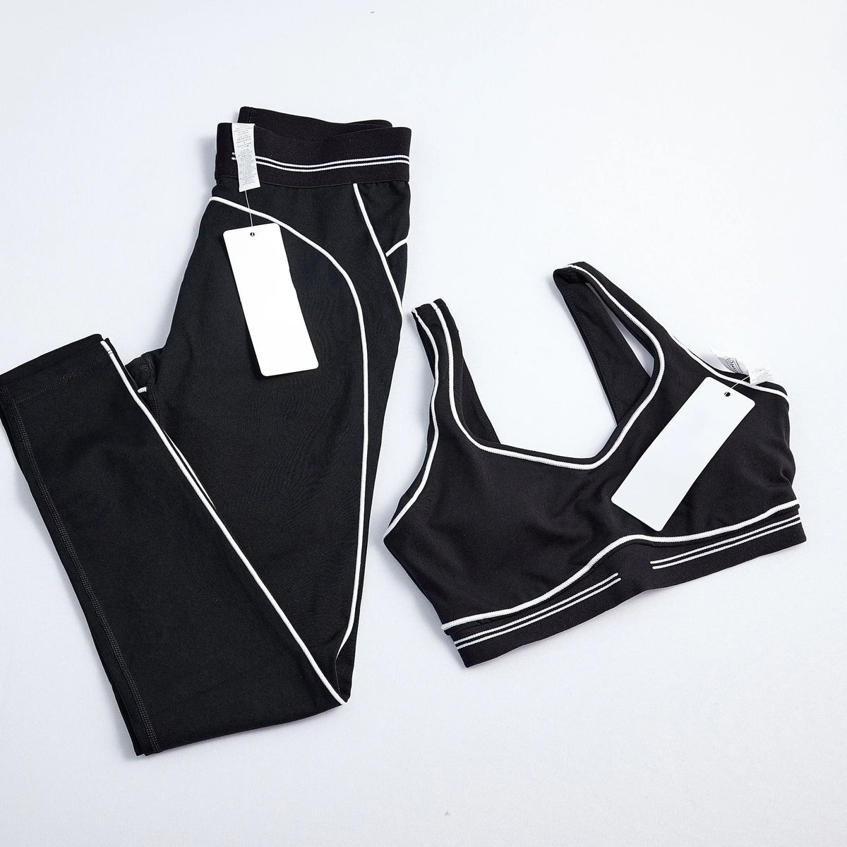Women's striped yoga set with leggings and breathable crop top for gym, running, and casual workouts