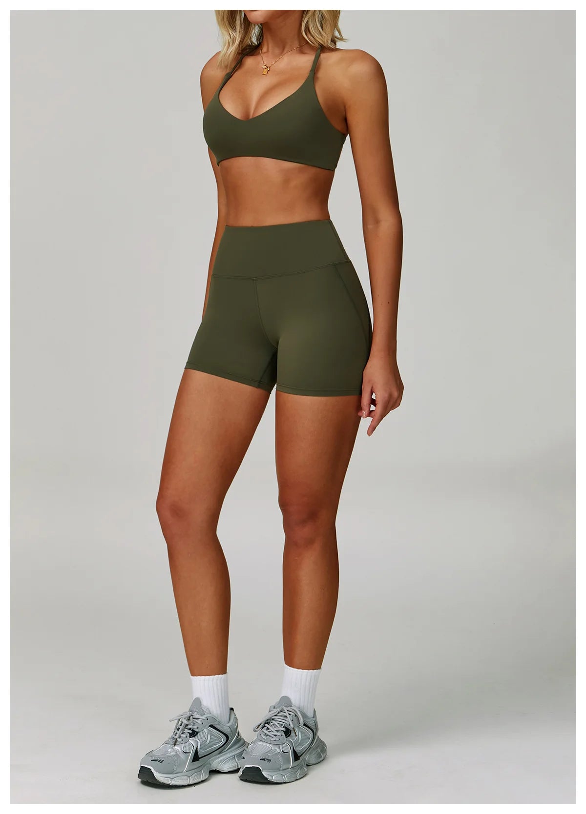 Women’s fitness tracksuit set by The Clothing Company Sydney with high waist leggings and sports bra for yoga and gym workouts.