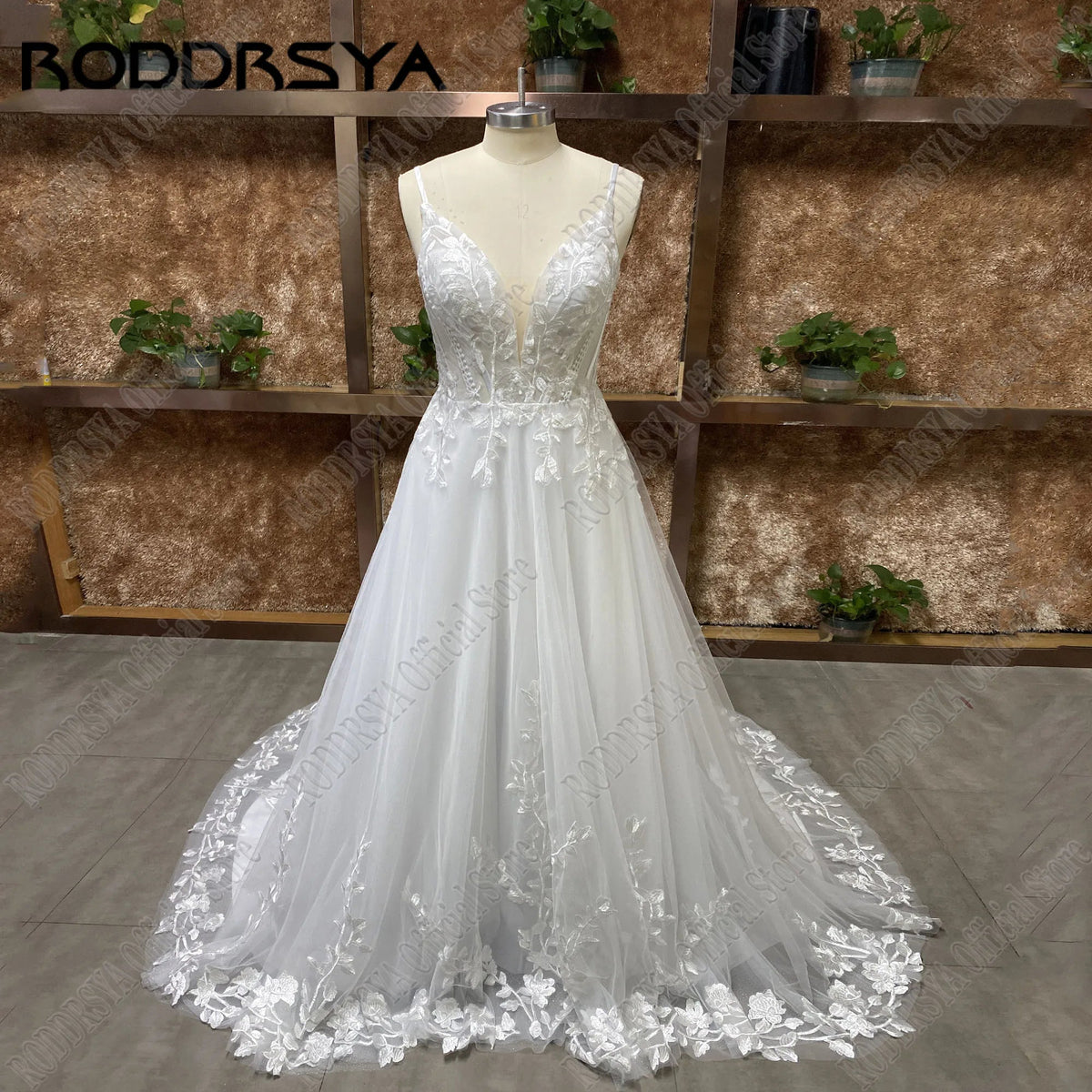 Glitter spaghetti strap v-neck backless boho wedding dress with applique and sweep train, custom design by The Clothing Company Sydney