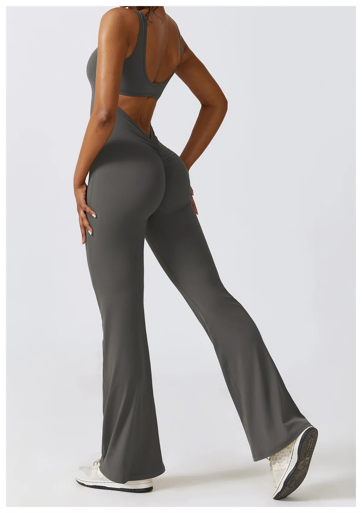 Open back V-neck fitness jumpsuit by The Clothing Company Sydney, women’s yoga and workout bodysuit with stretch fabric for training.