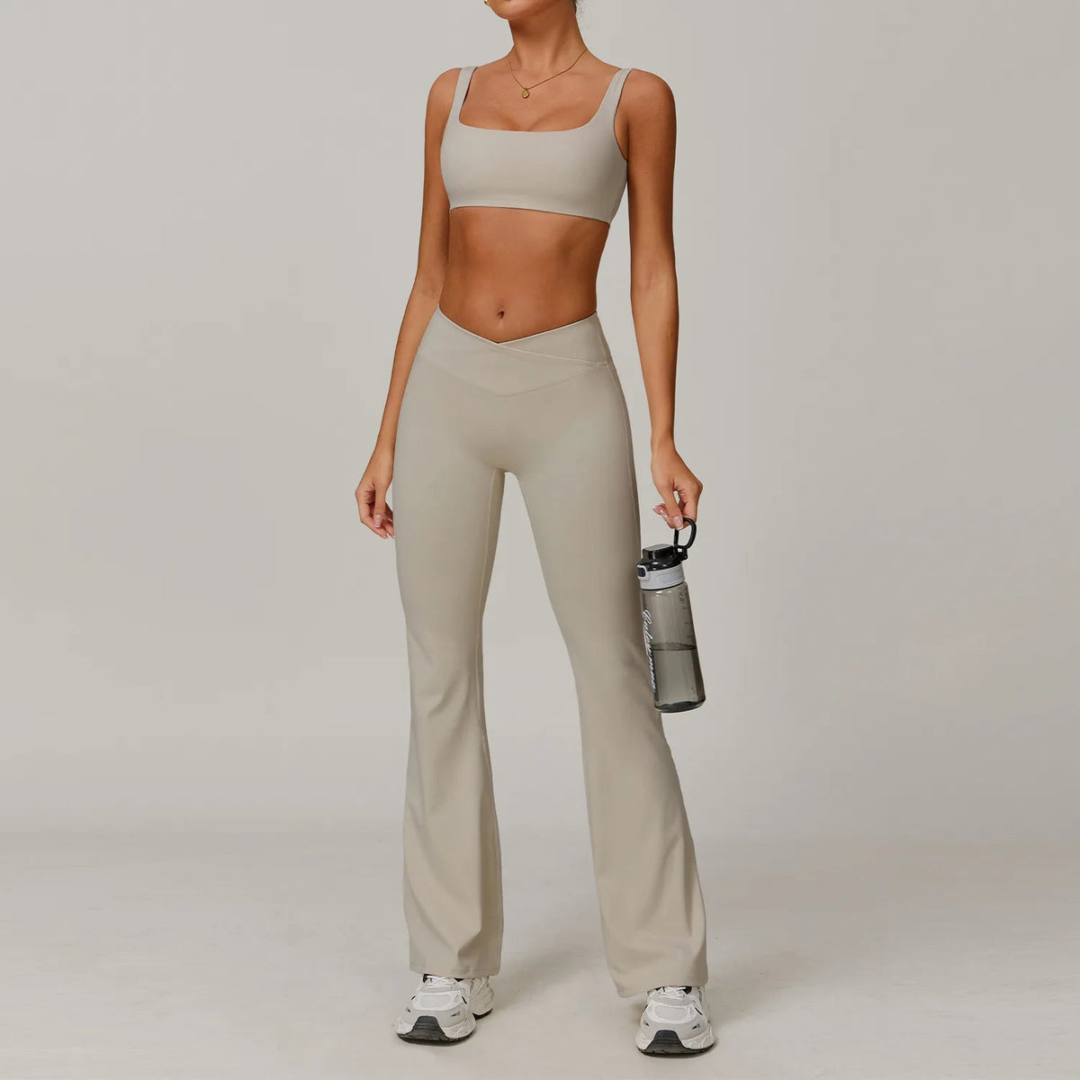 Two-piece women's yoga and workout set including sports bra and leggings from The Clothing Company Sydney, suitable for fitness and running.